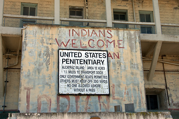 The first sign you see when you arrive on Alcatraz reminds you of the island’s rich human history. ©Candice Gaukel Andrews