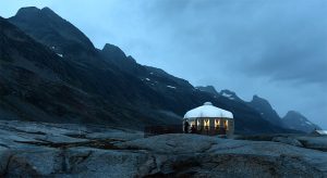 A refuge from the storm: A cozy evening spent in the lounge yurt for an evening film, safe from the elements outside.