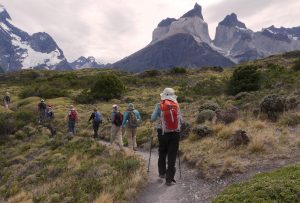 Guests hiking, Torres del Paine National Park, Patagonia, Chile.