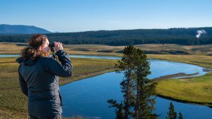 woman travel yellowstone national park tourism