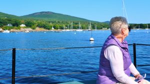 elderly woman sail boat maine new england