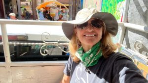 female woman traveler monarch butterfly migration conservation education Mexico